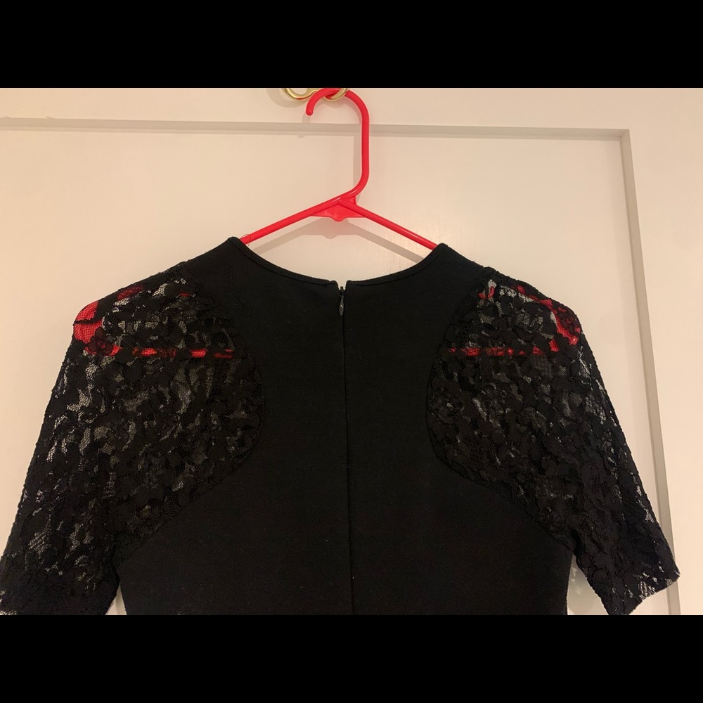 Black mini dress with lace sleeves